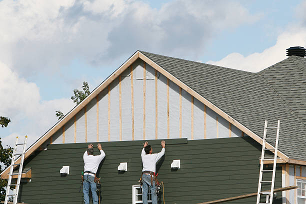 Professional Siding technician working in Pittsboro, NC